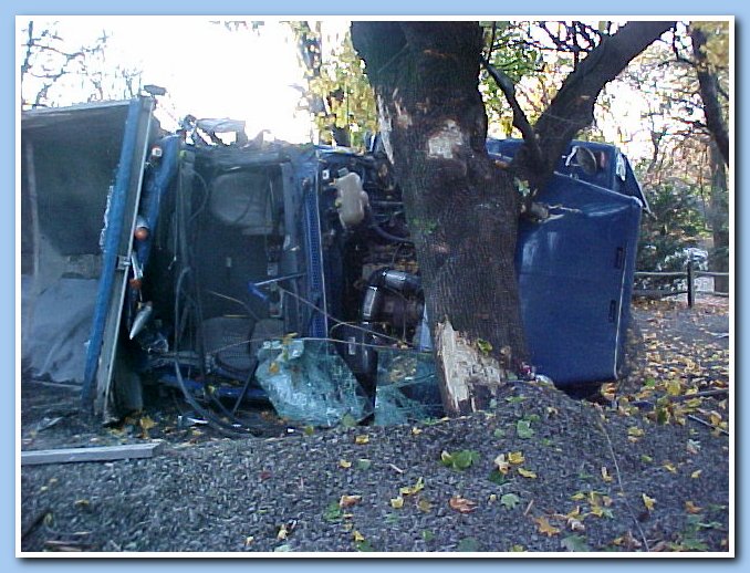 Rolled over triaxle dump truck